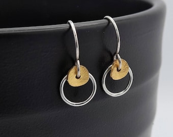 Silver & gold mixed metal earrings, double circle two tone earrings with open circles and textured wavy discs. Geometric jewellery gift