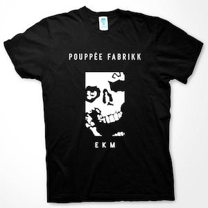 May include: Black t-shirt with a white skull graphic and the text "Poupée Fabrik" and "EKM" printed on the front.