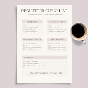 May include: A white paper declutter checklist with black text titled DECLUTTER CHECKLIST, 15 minute checklist for a calmer, less cluttered home. It features five sections: START SMALL, CLEAR THE EASY THINGS, KEEP ONLY WHAT YOU USE, RESET THE SPACE, and SOFT RESET.