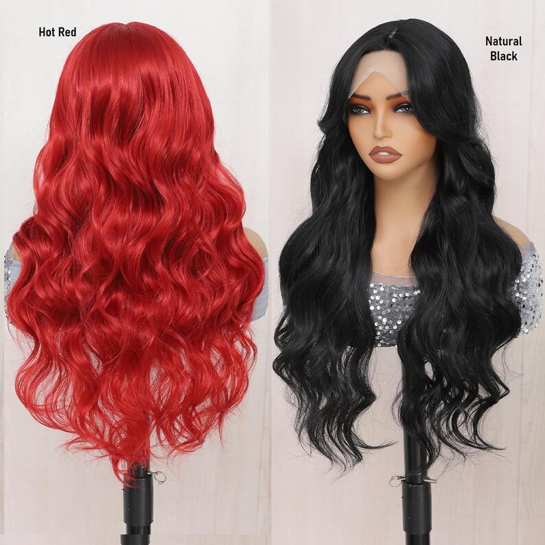 May include: Two long wavy wigs on mannequin heads. The wig on the left is hot red and the wig on the right is natural black.