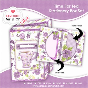 May include: A floral stationery box set featuring envelopes and note paper. The design incorporates a purple and white floral pattern, along with a teacup illustration. The text "Time For Tea Stationery Box Set" is displayed. The set is decorated with purple lace.