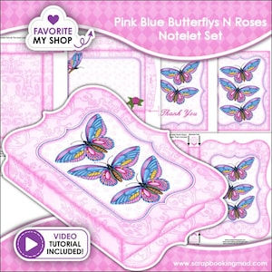 May include: A Pink Blue Butterflys N Roses Notelet Set featuring decorative stationery with pink and blue butterfly illustrations, floral accents, and ornate borders. The set includes multiple note card designs with text that reads Thank You.