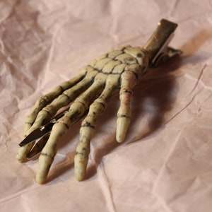 Plastic skeleton hand Hair Clip