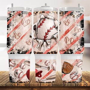 May include: Three stainless steel tumblers with a white, red and black baseball themed design. The tumblers feature a baseball, bats, gloves and hearts.
