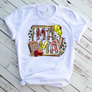 May include: White t-shirt with a graphic design featuring the words "Mama May" in a colorful, patterned frame. The design also includes baseballs, bats, and a bag of peanuts.