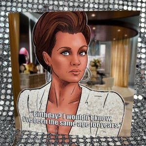 May include: A digital illustration of a woman with brown hair and a white shirt. The woman is looking at the viewer with a serious expression. The text "Birthday? I wouldn't know. I've been the same age for years." is written below the woman.