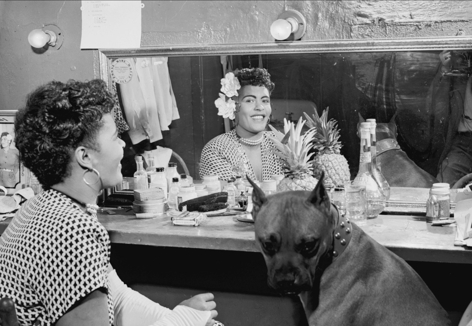 Portrait of Billie Holiday and her dog Mister at Downbeat, New 
