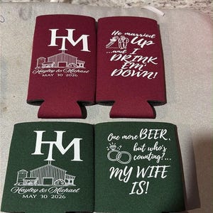 May include: Two burgundy and two dark green foam can coolers. The burgundy ones feature white text reading HM, a barn illustration, and Hayley & Michael MAY 30 2026, or He married up and I DRINK EM DOWN. The green ones feature the same HM design or One more BEER, but who's counting? my WIFE IS!
