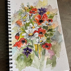 May include: Watercolor painting of a bouquet of red poppies, white daisies, and purple flowers. The flowers are painted in a loose, impressionistic style with splashes of color.