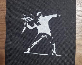 Banksy flower molotov.