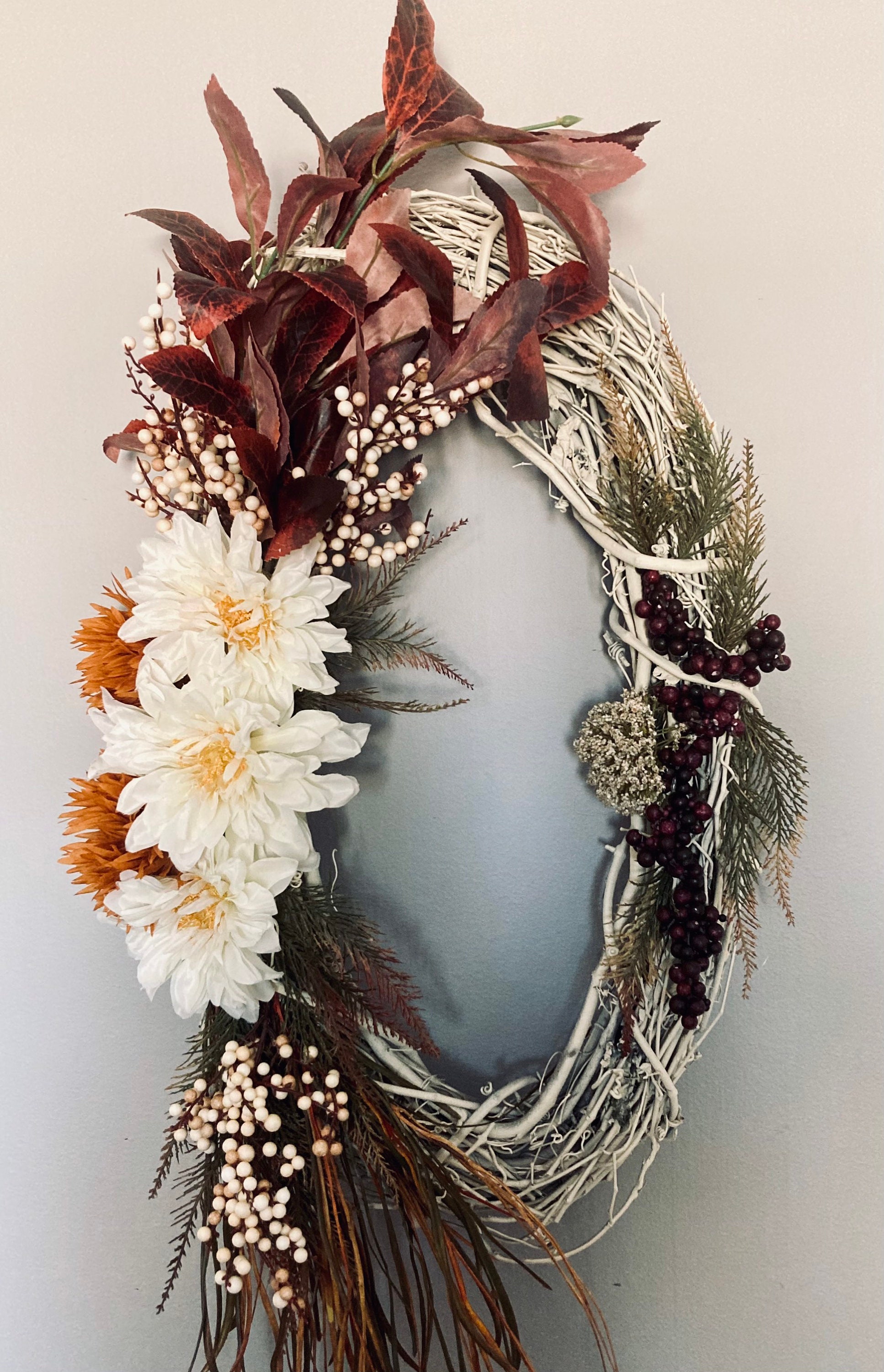 Rustic Oval Grapevine Wreath decorated with the rich colors of Etsy