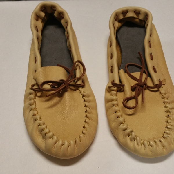 Leather moccasins with crepe soles.