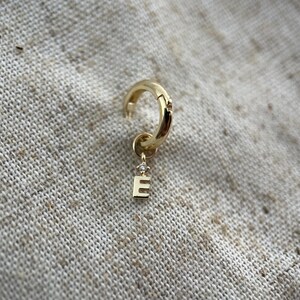 Initial ‘E’ alphabet gold hoop charm set with a genuine diamond. Single charm.