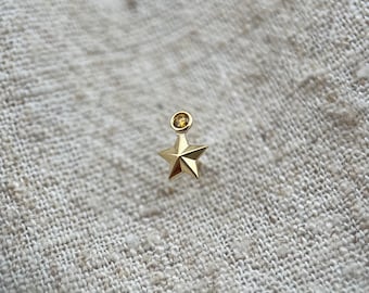 18ct yellow gold star stud with genuine bright yellow diamond