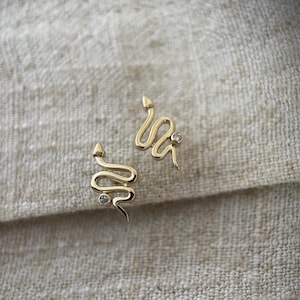 Snake ear studs with genuine diamonds earring 9ct solid yellow gold. Sold as single or in pair.