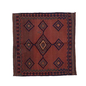 May include: A rectangular, hand-woven rug with a central diamond pattern in shades of red, blue, and green. The rug features a repeating geometric border design. The rug's dimensions are approximately 48 inches by 60 inches.