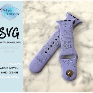 May include: Purple Apple Watch band with a kawaii boba tea design. The band features a boba tea cup with a straw, a rainbow, and a smiling face. The text "SCORE+ENGRAVE" is visible in the image.