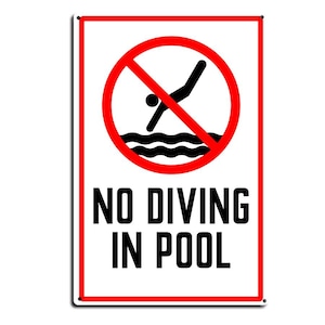 May include: A rectangular white sign with a red border featuring a black graphic of a person diving into water inside a red circle with a diagonal slash. The text NO DIVING IN POOL is printed in bold black capital letters below the graphic.