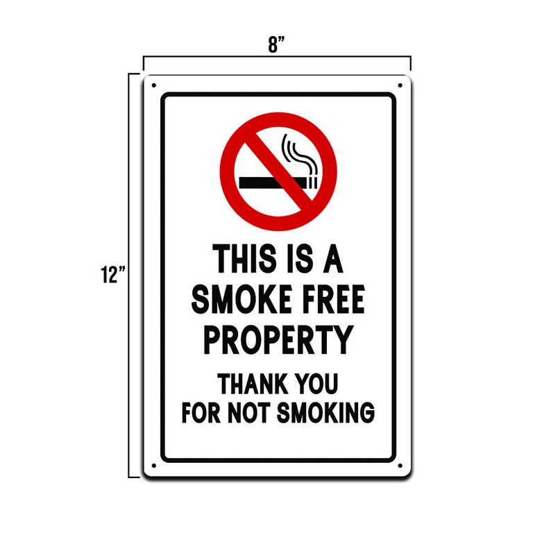 Puede incluir: Un cartel rectangular blanco con un c&iacute;rculo rojo y una l&iacute;nea diagonal que lo atraviesa. El c&iacute;rculo contiene un cigarrillo negro con humo saliendo de &eacute;l. El cartel dice "THIS IS A SMOKE FREE PROPERTY THANK YOU FOR NOT SMOKING". El cartel mide 20,3 cm de ancho y 30,5 cm de alto.