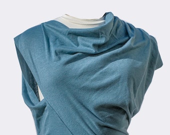 Contemporary, asymmetrical top. Lt. teal. Grey.