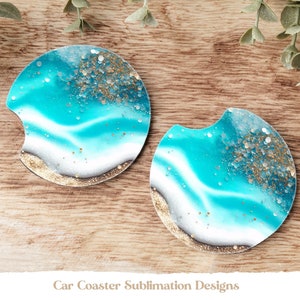 May include: Two round car coasters with a blue, white, and gold abstract design. The coasters have a cutout for a cup.  Car Coaster Sublimation Designs.