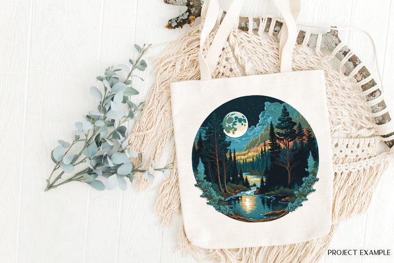 May include: A white tote bag with a circular design featuring a moonlit forest scene. The design includes a full moon, trees, a river, and stars in the night sky.