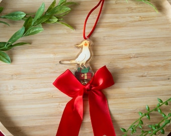 Christmas ornament with bow - cockatiel & gifts