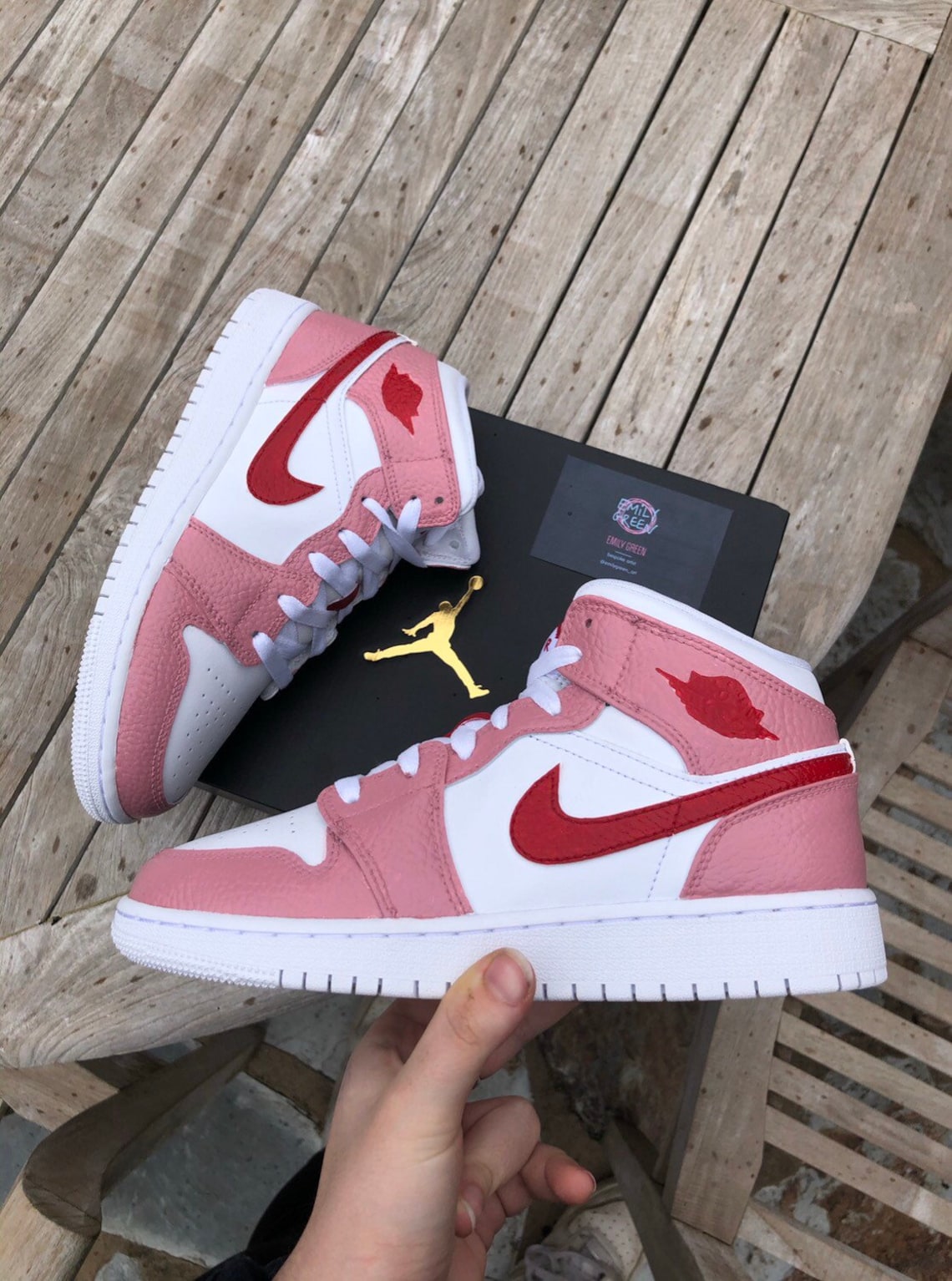 red and pink jordan shirt