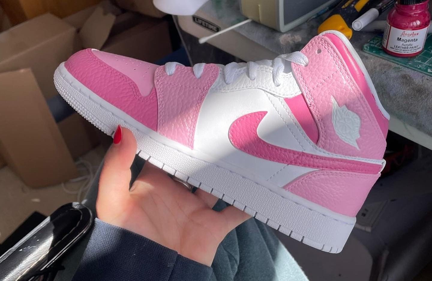 woman pink jordans