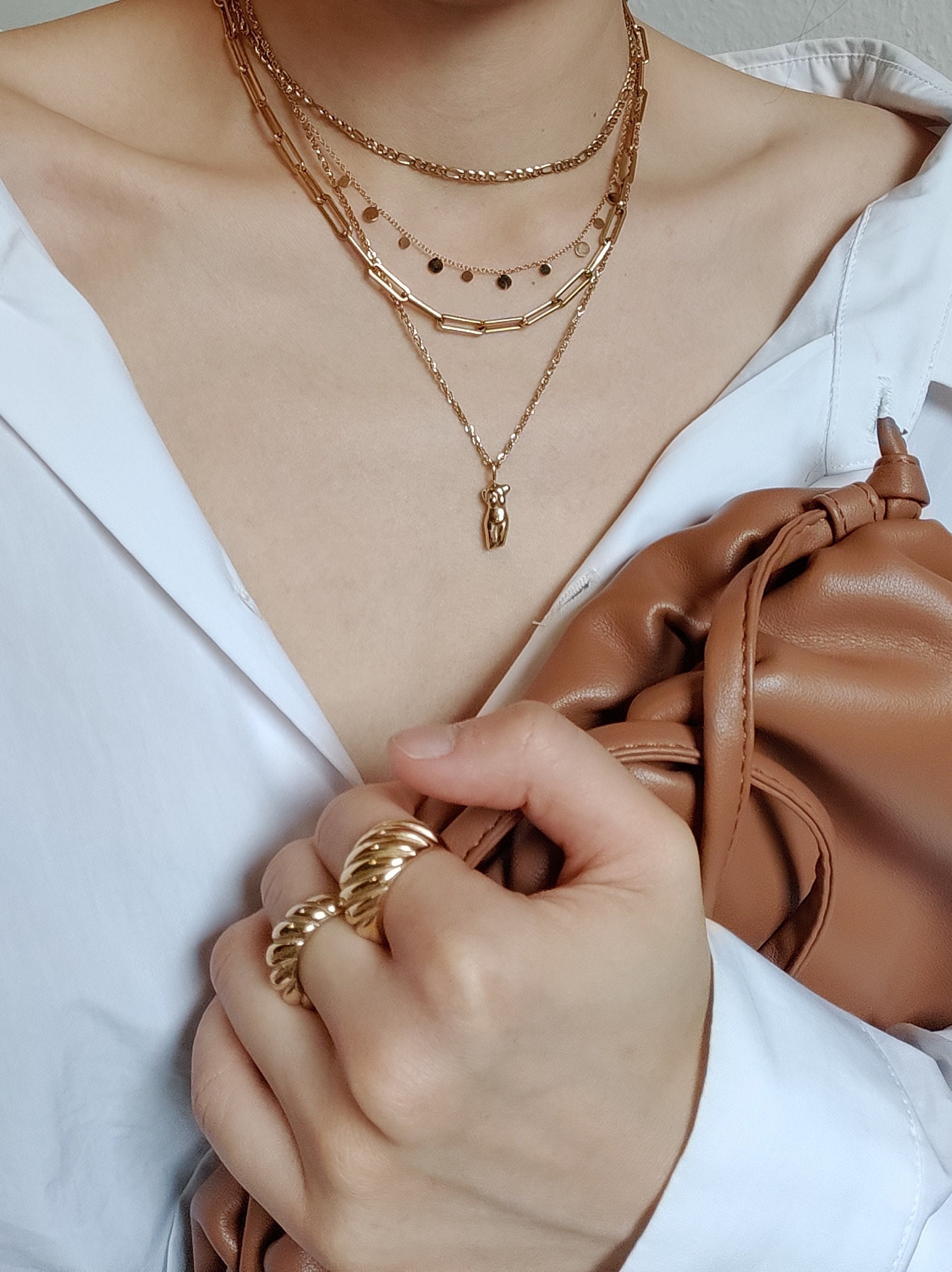 Gold aegis on sale chain necklace