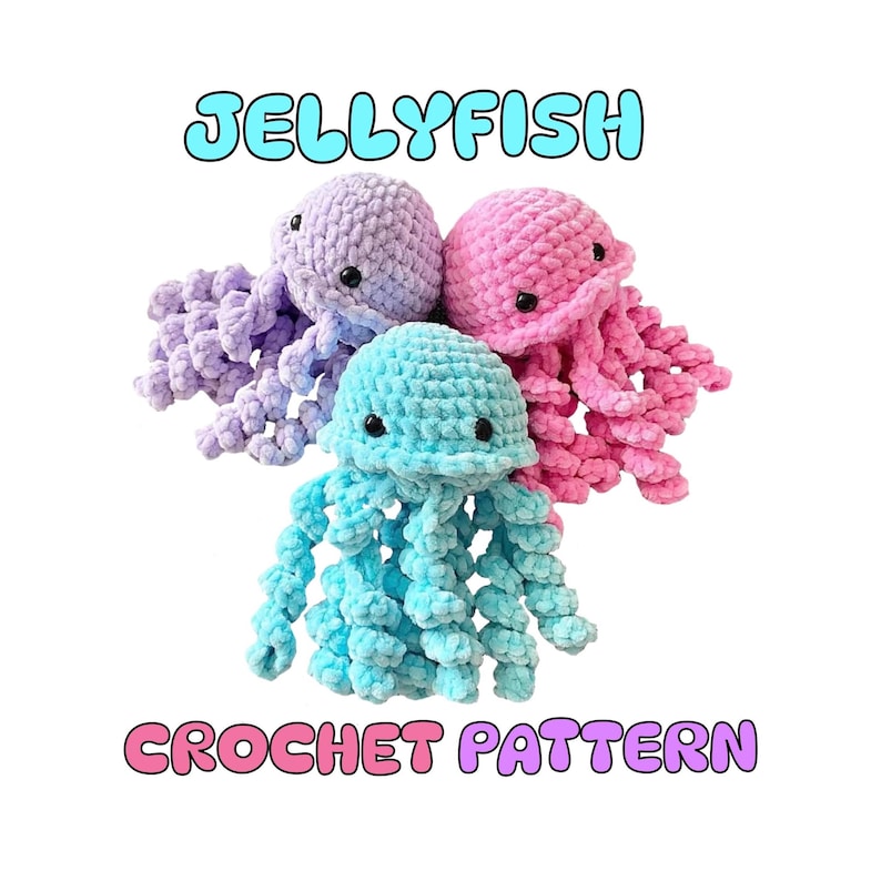 May include: Three crocheted jellyfish in shades of purple, pink, and teal. Each jellyfish has a rounded head and long, curly tentacles. The word "JELLYFISH" is written above the jellyfish, and "CROCHET PATTERN" is written below.