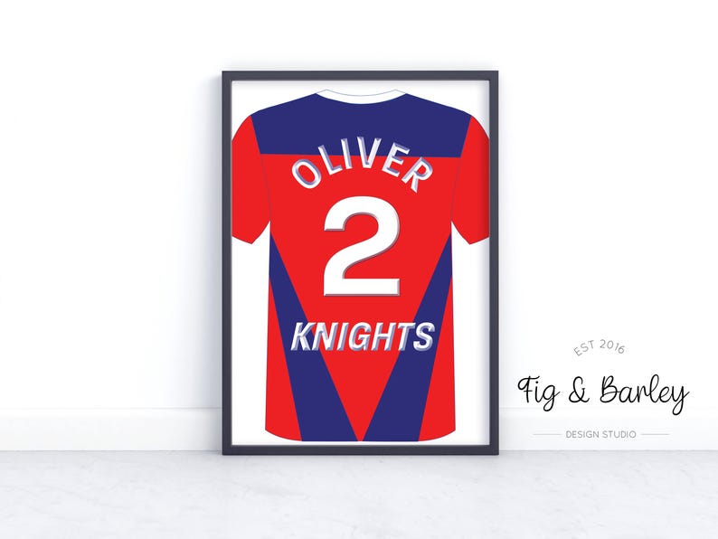 May include: A framed print of a red and blue jersey with the name "Oliver" and the number "2" on the back. The jersey also has the word "Knights" printed on the front.
