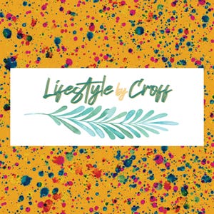May include: The image features the text "Lifestyle by Croff" in a script font, with a watercolor-style leaf design below. The background is a vibrant yellow with colorful paint splatters in shades of blue, pink, and orange.