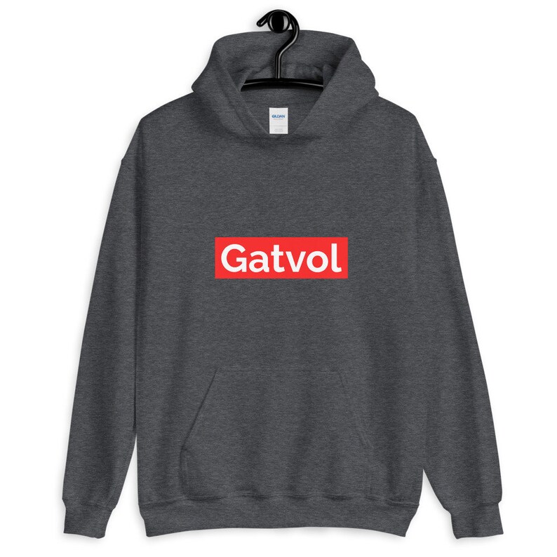 May include: A dark grey hooded sweatshirt with a red box and the word "Gatvol" in white letters.