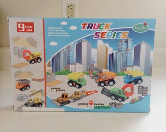 Truck Series Toy Construction Vehichles 9 Piece Set Miniature Toy cars. New! Factory sealed. Makes a great holiday Christmas gift or stockin