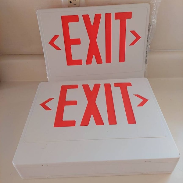10" Hardwired Double-sided Red EXIT Sign Emergency Light with all Mounting Hardware amd Installation Instructions. UL Listed. New old stock.
