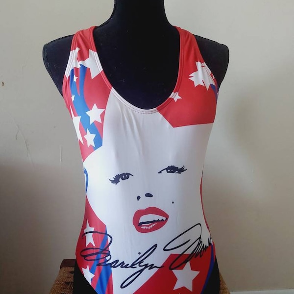 Size L Marilyn Monroe Stars and Stripes Red, White, and Blue Crossback Strap Women's Ladies One-piece Bathing Suit. 88% Polyester,