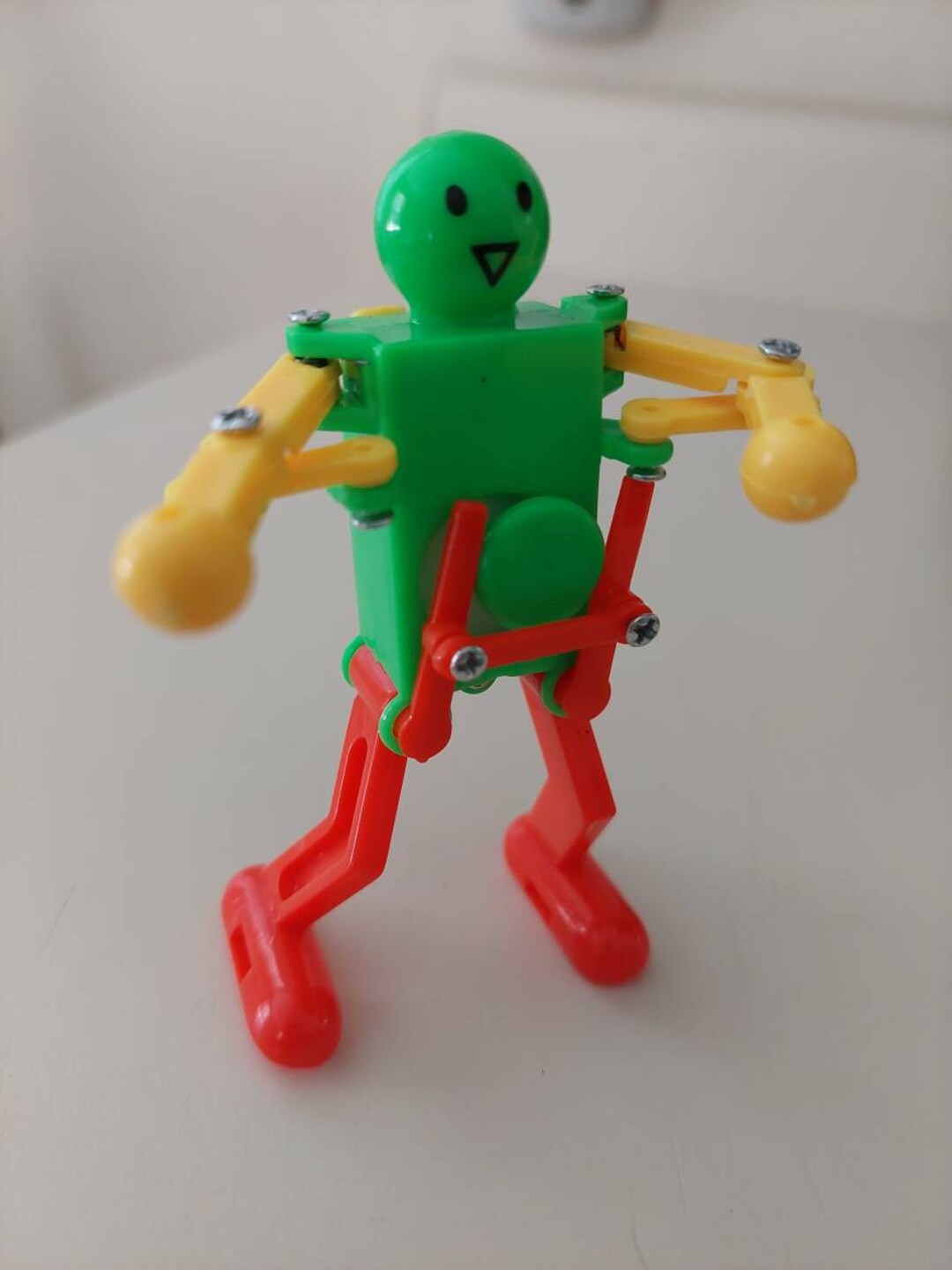 3.5 Fun Windup Dancing Robot Toy Red Green and Yellow. Makes a Great
