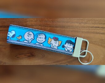 Peanuts Schlüsselband Snoopy - Elastisch, 112 Cm, Orange-Schwarz Collage