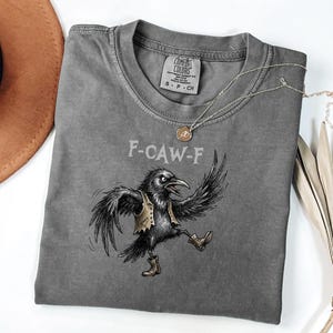 F-CAW-F Rabe Illustration T-shirt | T-Shirt mit Tanzende Krähe