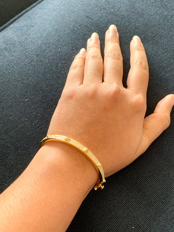 Gold spiked bracelet discount