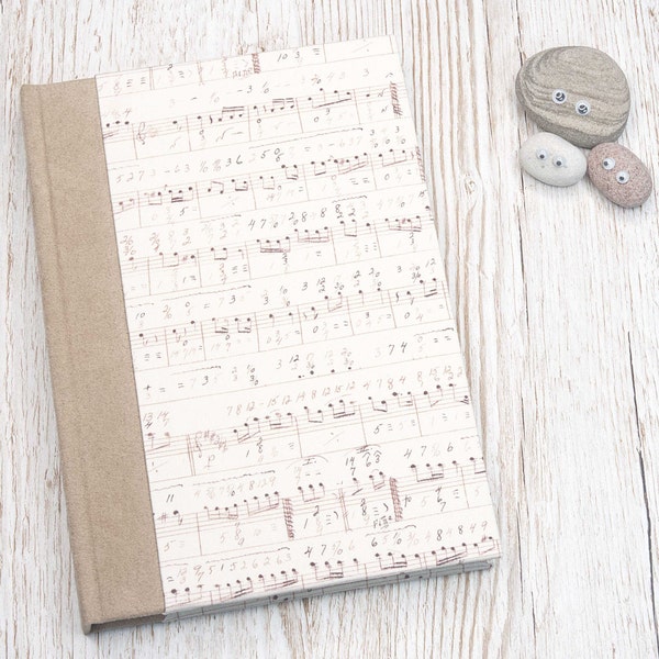 A5 Sketchbook/Journal with Sheet Music Design and Fawn-coloured Spine. Hand-bound with Cartridge Paper or 100% Cotton Watercolour Paper