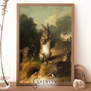 May include: A vintage oil painting depicting three brown rabbits in a woodland setting. The rabbits are in various poses, with one standing upright and two sitting. The painting has a warm, earthy color palette and a realistic style.