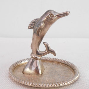 Dolphin ring holder deals