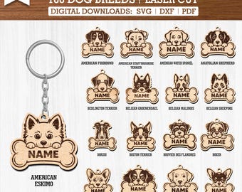 May include: Wooden dog tag with an American Eskimo design, attached to a keychain. The tag features a dog illustration holding a bone with the word "NAME" on it. The image also displays 100 dog breeds.