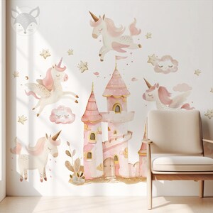 May include: Pink and gold unicorn wall decals with a pink castle and clouds. The decals are perfect for a child's bedroom or playroom.
