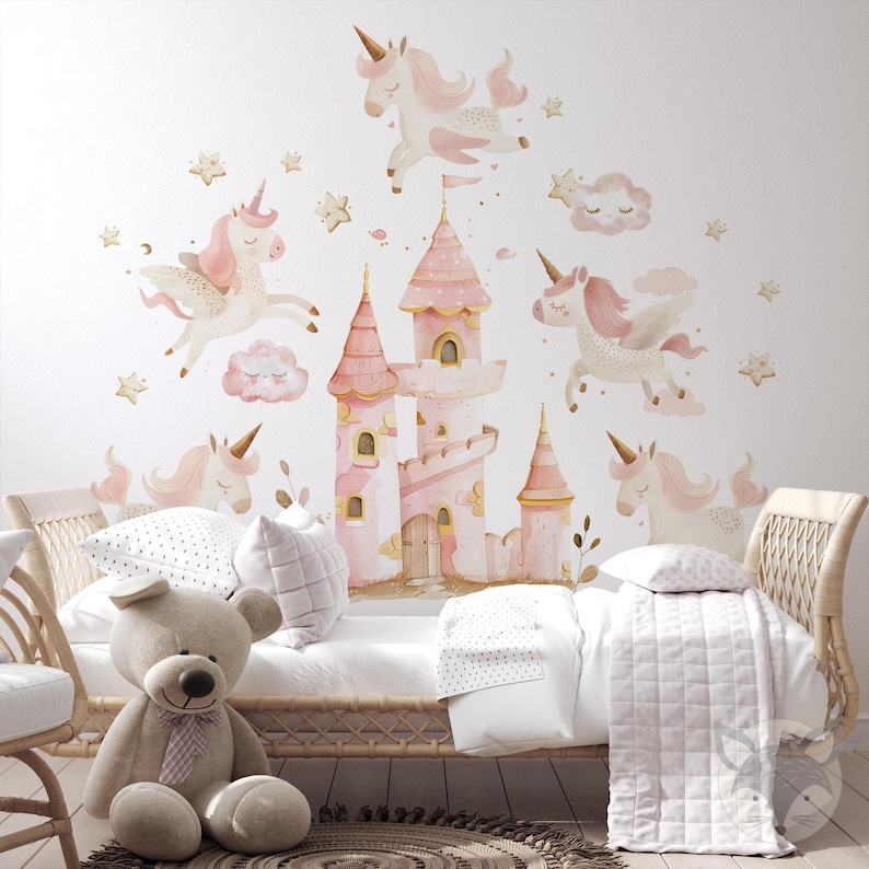 May include: A pink and gold castle with unicorn wall decals. The castle has a tower with a pointed roof and a window. The unicorns are flying in the air and have pink and white manes and tails. The decals are perfect for a child's bedroom.