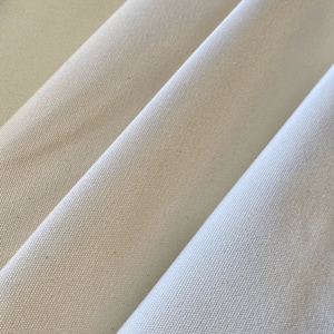 Geschuurd katoenen canvas 12oz, 220cm breed voor interieurprojecten en nog veel meer! Crème / gebroken witte afwerking.