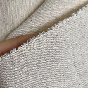 Lona de algodón de 8 oz sin blanquear. 100% algodón, 160 cm de ancho, 295 g/m². Para tapizados, cojines y más.