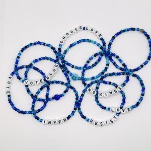 May include: A set of three ceramic mugs with a speckled, matte finish. The mugs are in shades of cream, light gray, and dark gray. Each mug has a simple, minimalist design, perfect for coffee or tea.